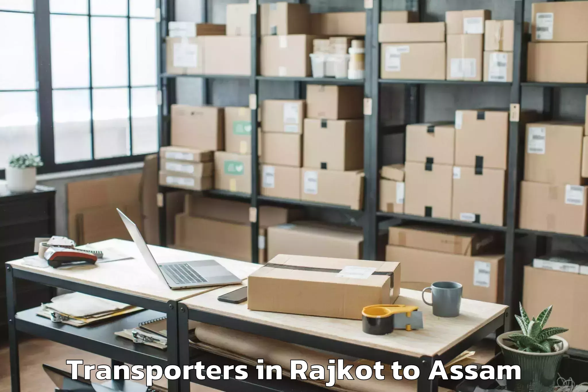 Book Rajkot to Baihata Transporters Online